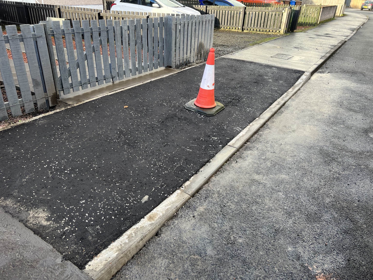 Dropped kerb and resurfaced driveway crossing